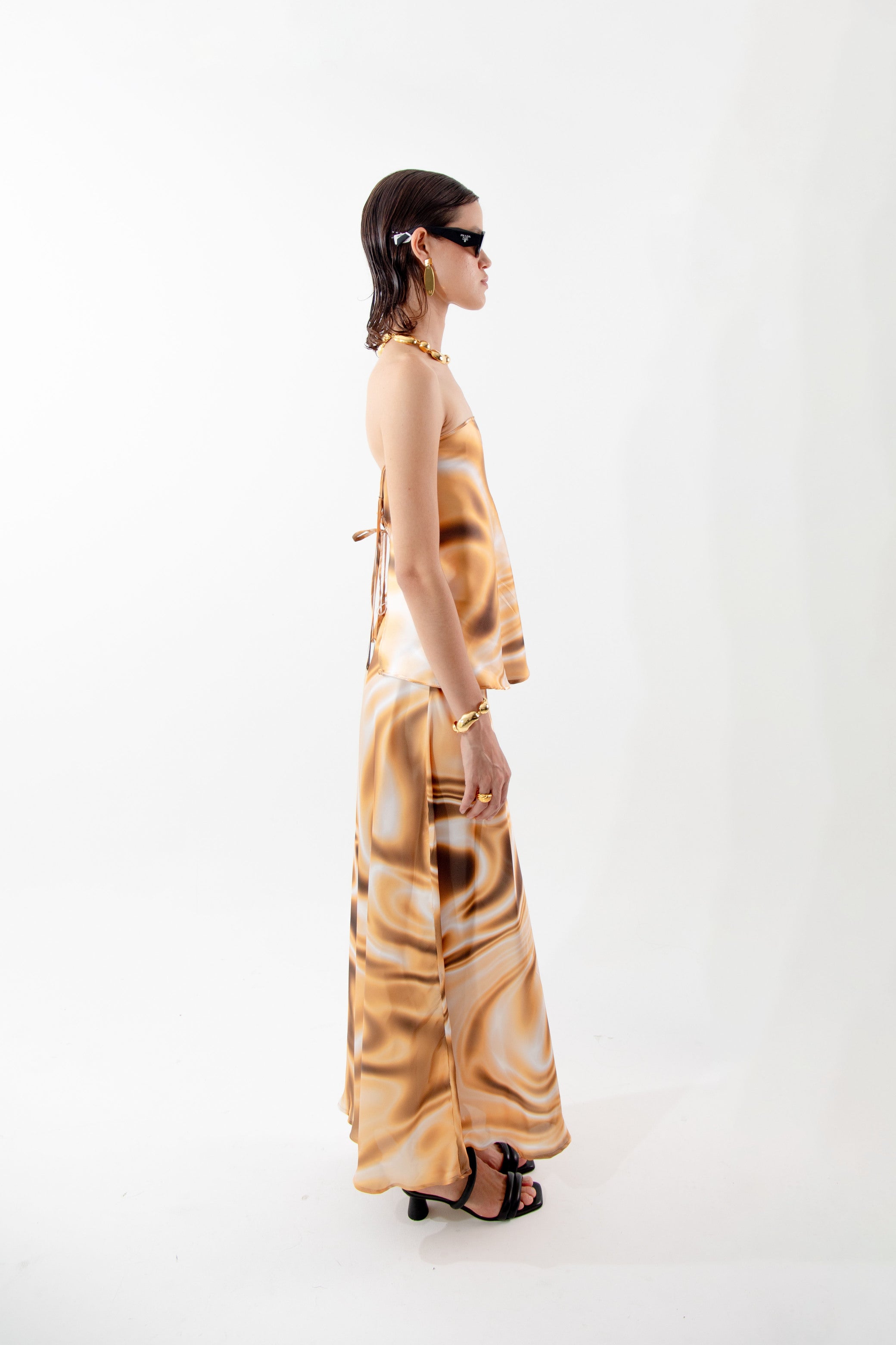 THE ‘LIQUID GOLD’ TOP